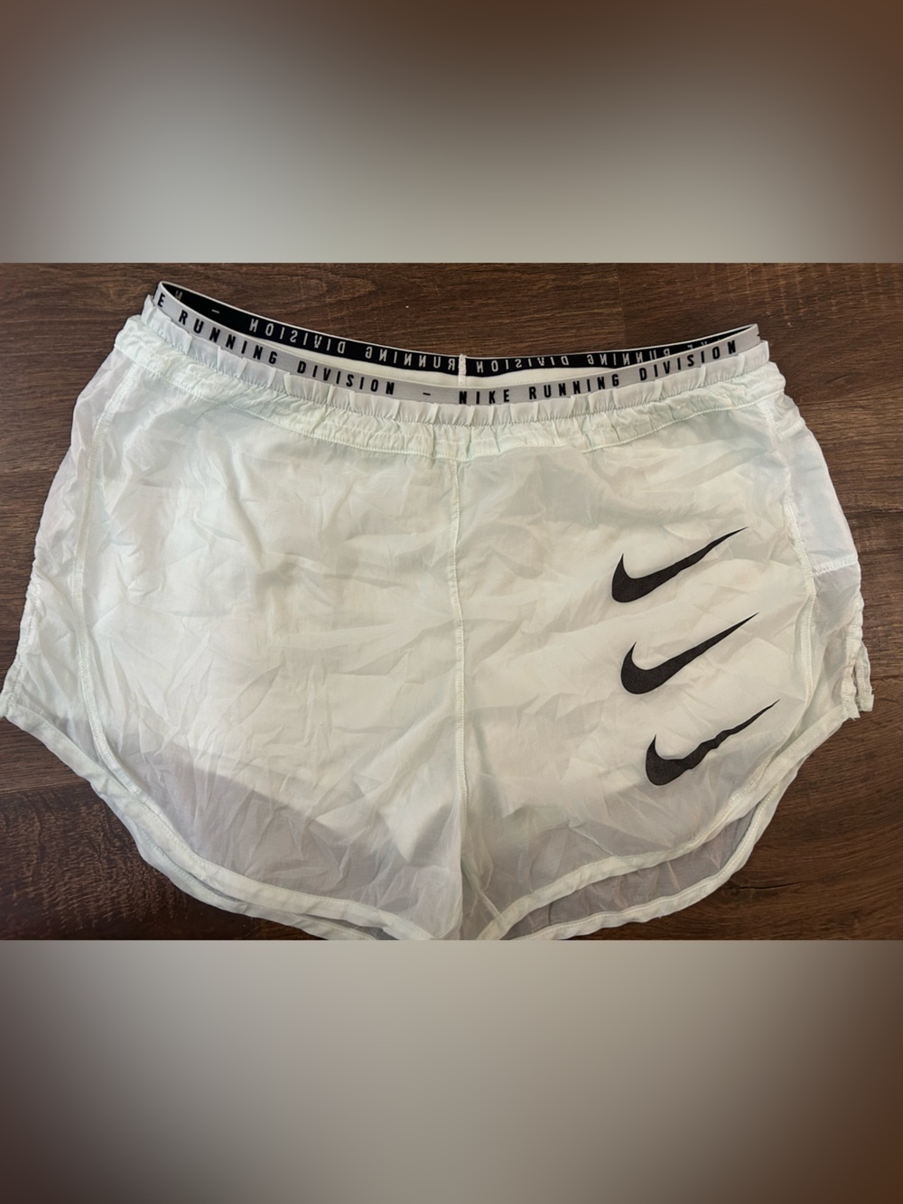 Nike White Athletic Running Shorts with Black Swoosh
